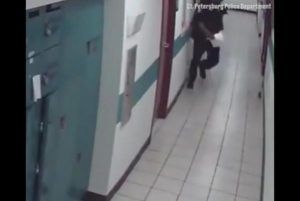Florida-police-officer-flees-from-mouse-in-CCTV-footage