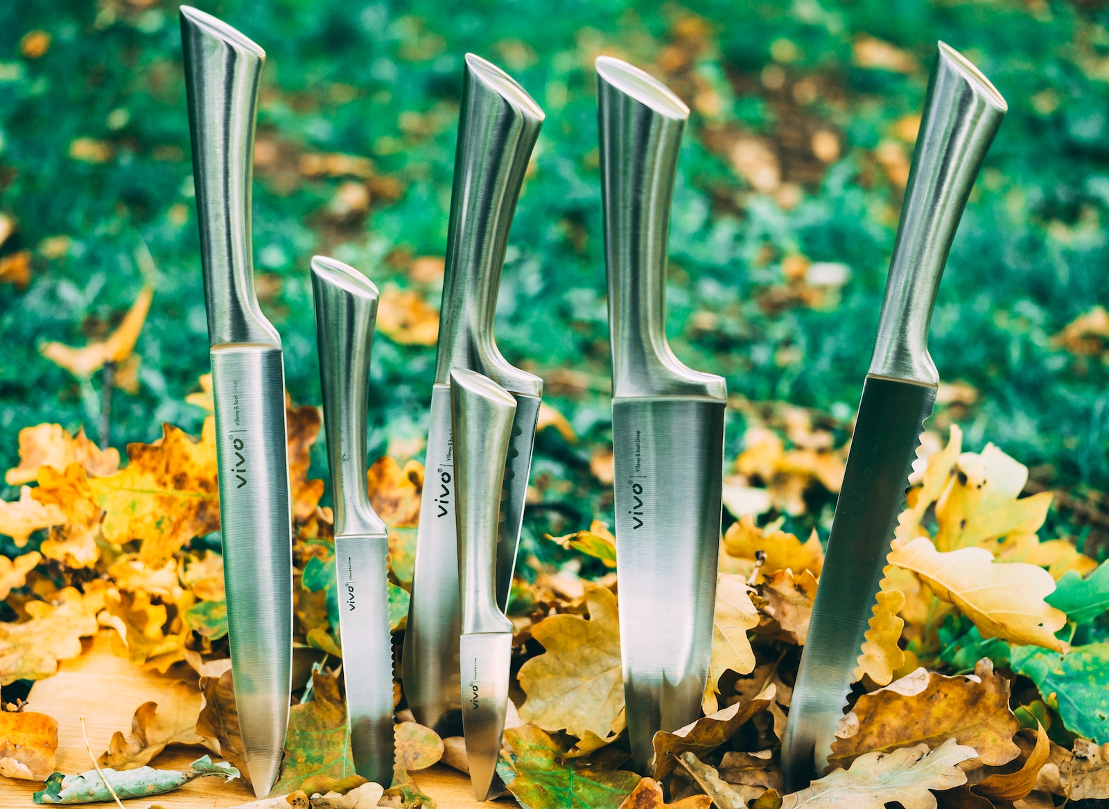 six grey stainless steel knives