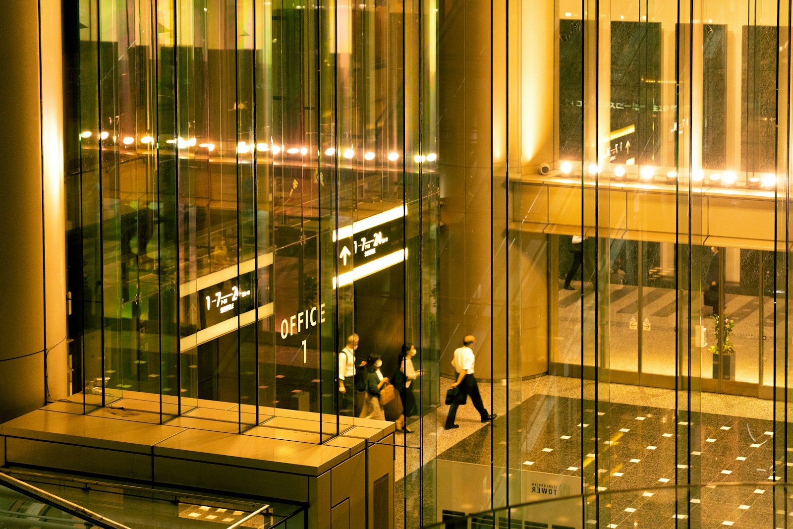 people walking in a building