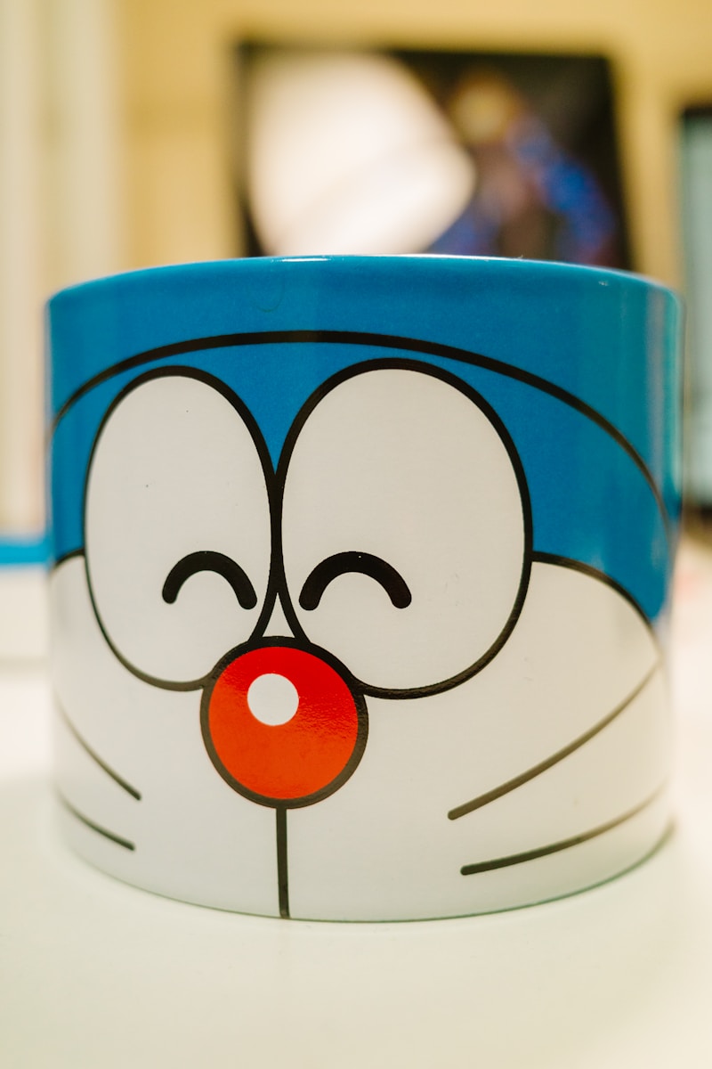 A close up of a cartoon mug on a table