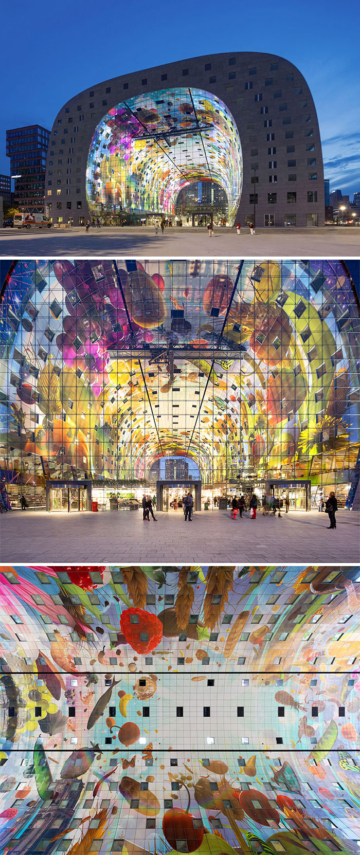 Moderná budova s farebnými sklenými panelmi a futuristickým dizajnom, nočný pohľad, umenie a architektúra.