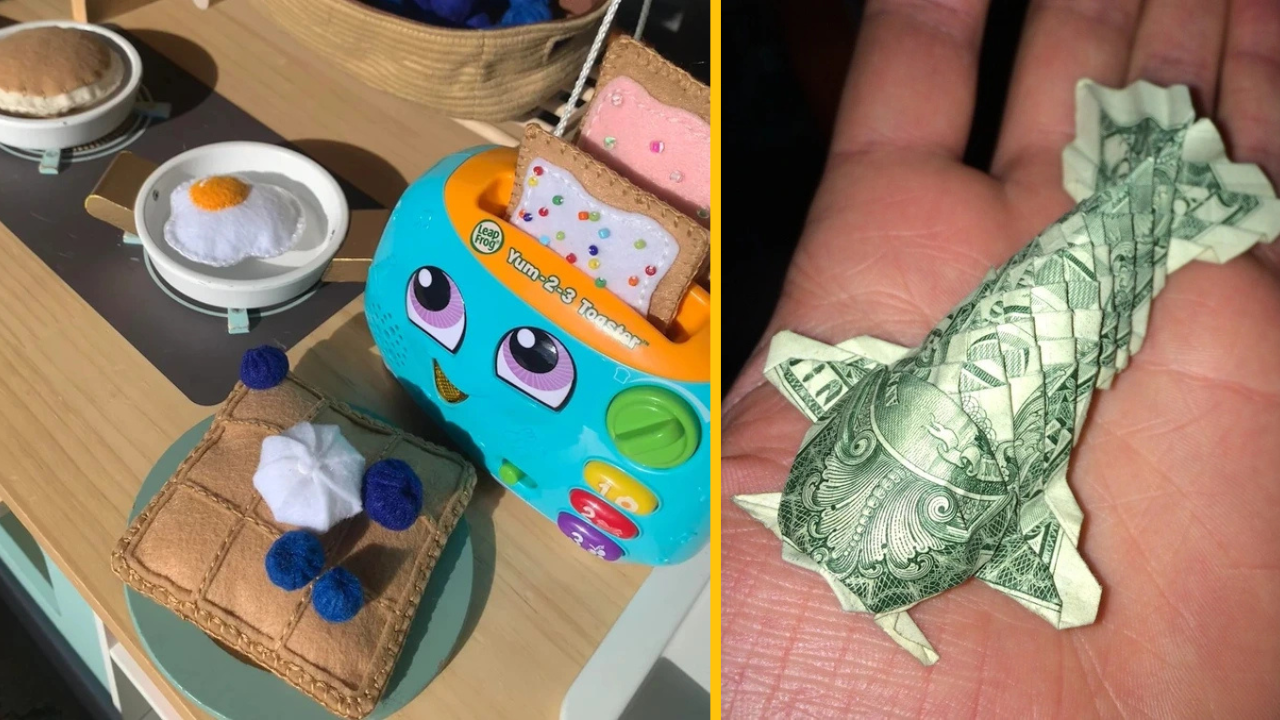 Hračka toaster s toastom a origami ryba z bankovky na dlani.