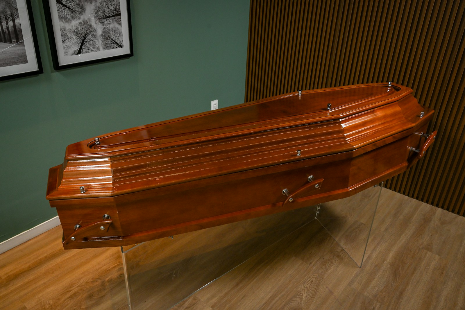 A wooden boat sitting on top of a wooden floor
