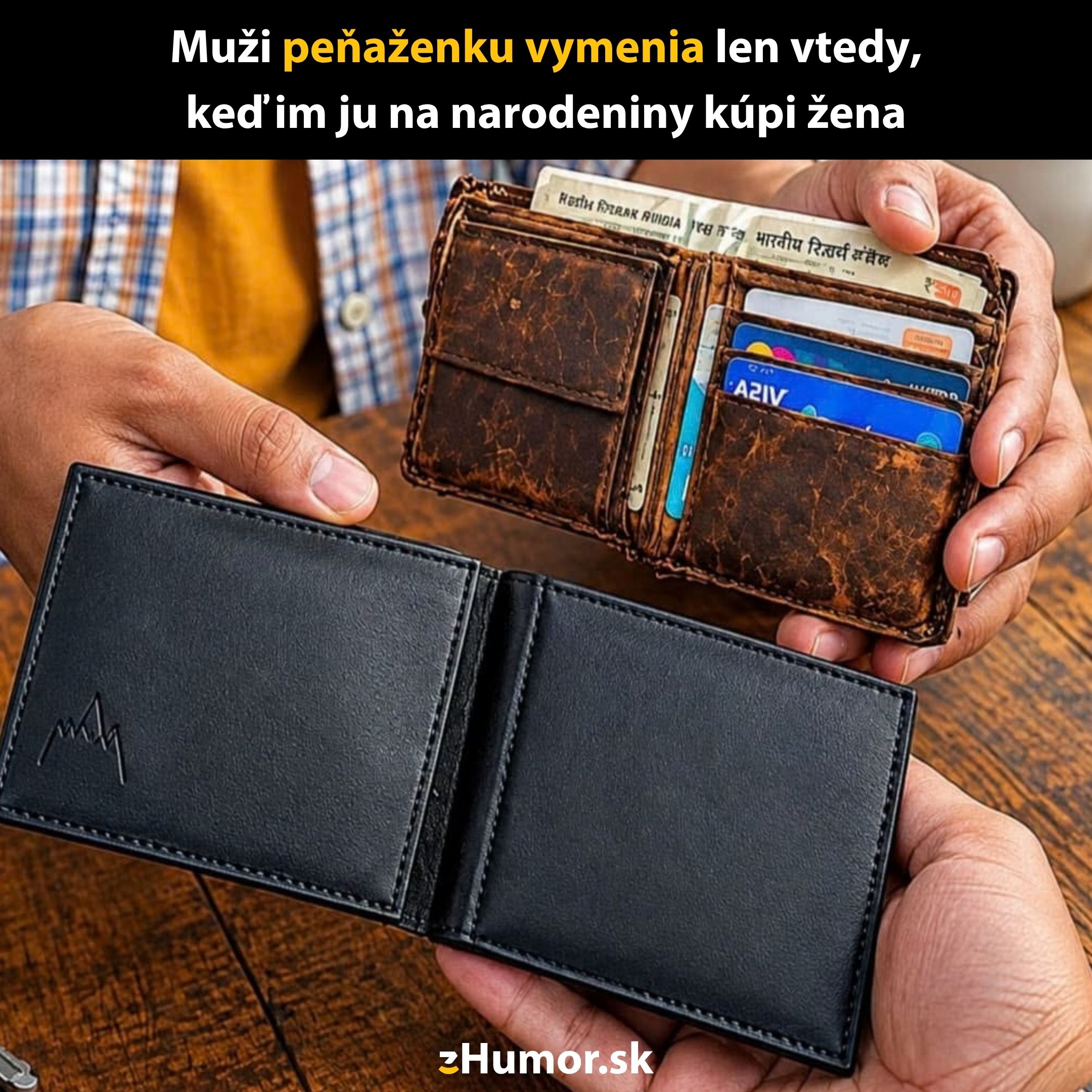 Dve peňaženky v rukách: stará hnedá a nová čierna na drevenom stole.